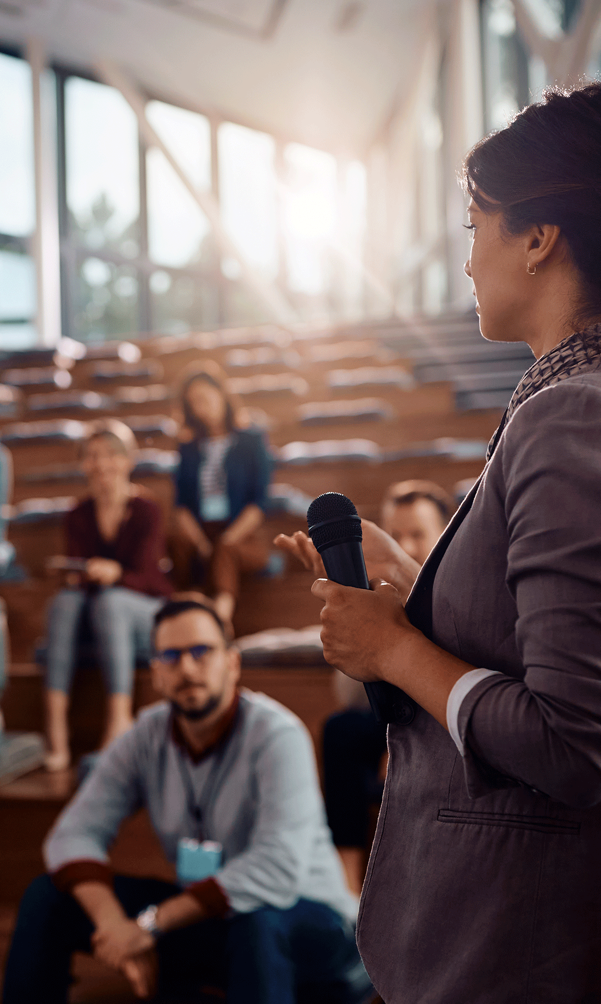 female-business-leader-talking-to-group-of-seminar-2024-12-13-19-22-49-utc-2